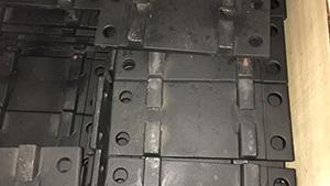 Rail tie plate by casting