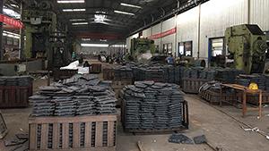 Rail tie plate by rolling