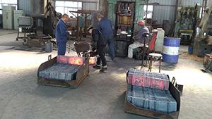 Rail tie plate by forging